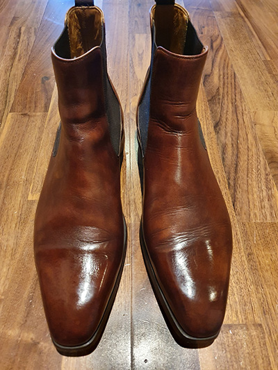 Pair of brown Magnanni Chelsea boots after a shoeshine